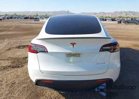 2022 Tesla Model Y from USA, damaged, VIN 7SAYGDEF6NF409540